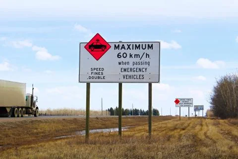 Maximum speed while passing emergency vehicles sign Stock Photos