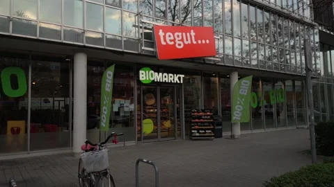 May 1, 2026. Munich, Germany. Tegut Biomarkt Eingang zum tegut Biomarkt in Video stock 334066214