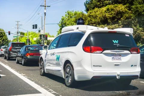 May 11, 2018 Mountain View / CA / USA - Waymo self driving car cruising on th Stock Photos