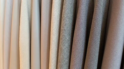 May 15, 2026 - Germany - Wall displaying colorful fabric materials Vídeos de archivo 338131597