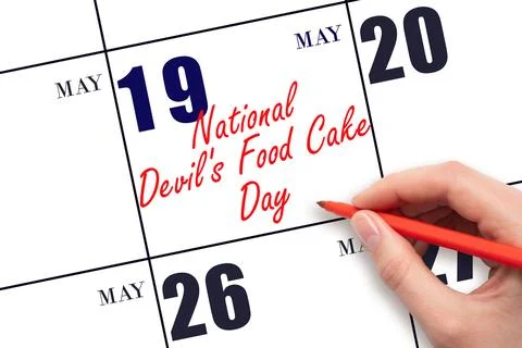 May 19. Hand writing text National Devil's Food Cake Day on calendar date. .. Stock Photos