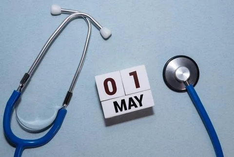 May 1st. Image of may 1 wooden calendar on the table. Stock Photos
