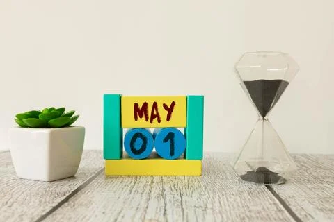May 1st. Image of may 1 wooden calendar on the table. Stock Photos