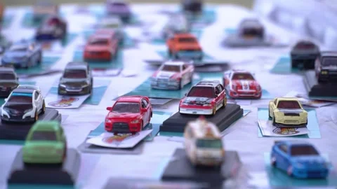May 20, 2018 Indonesia - Assorted Die-Cast Toy Cars Displayed on a Colorful.. Stock Footage 302608453