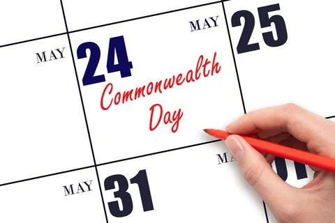 May 24. Hand writing text Commonwealth Day on calendar date. Save the date. Stock Photos