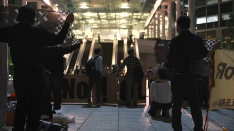 May 28, 2021 - Protest against the 2020/2021 Tokyo Olympics in Tokyo, Japan - 4K Stock Footage 154898237