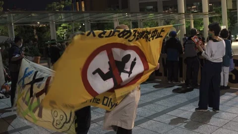 May 28, 2021 - Protest against the 2020/2021 Tokyo Olympics in Tokyo, Japan - 4K Stock Footage 154898526