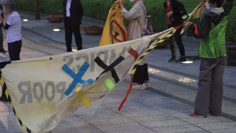 May 28, 2021 - Protest against the 2020/2021 Tokyo Olympics in Tokyo, Japan - 4K Stock Footage 154898630