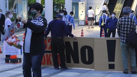 May 28, 2021 - Protest against the 2020/2021 Tokyo Olympics in Tokyo, Japan - 4K Stock Footage 154898665
