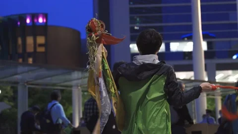 May 28, 2021 - Protest against the 2020/2021 Tokyo Olympics in Tokyo, Japan - 4K Stock Footage 154898712