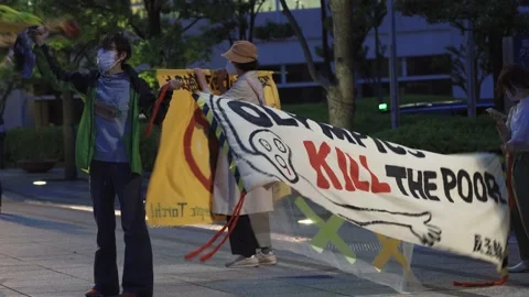 May 28, 2021 - Protest against the 2020/2021 Tokyo Olympics in Tokyo, Japan - 4K Stock Footage 154898727