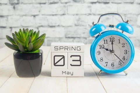 May 3 on the wooden calendar. Third day the spring month, a calendar at the w Stock Photos