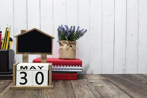 May 30th calendar date text on white wooden block on wooden desk Stock Photos
