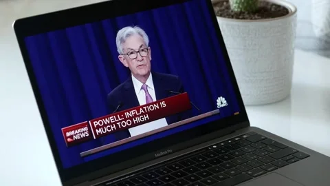 MAY 4, 2022: Fed Chair Jerome Powell Talking about Inflation, Wathing the Video Stock Footage 232394870