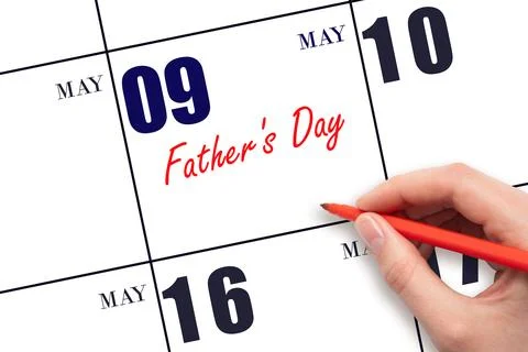 May 9. Hand writing text Father's Day on calendar date. Save the date. Stock Photos
