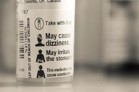 May cause dizziness caution medication label 스톡 사진