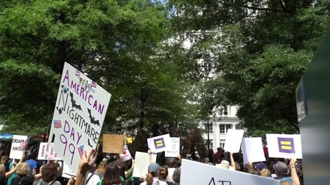May Day protesting the policies of President Trump Stock Footage 76835548