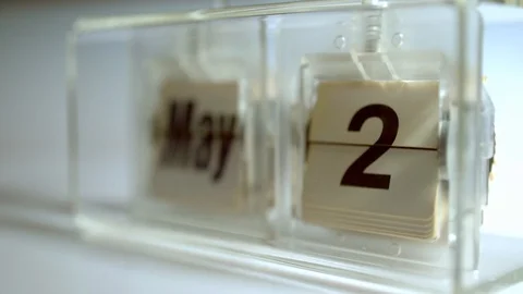 May. Old mechnical tabletop calendar at 4k. Parto of full year loop. Check my po Stock Footage 91106853