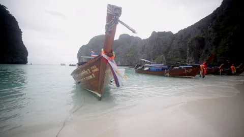 Maya Bay beach in Koh Phi Phi Le, popular tourist destination in Thailand. Boat. Stock Footage 108523041