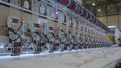 Maya embroidery machine is creating decorative textile pattern on the fabric Stock Footage 347242845
