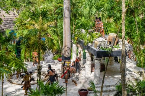 Maya indians men dancing on the platform in the tropical jungle, Playa del Ca Stock Photos