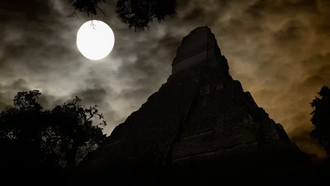 Maya Pyramid of Tikal, Time Lapse by Night with Full Moon in Mayan Site Stock Footage 121330424