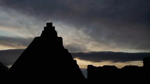 Maya Pyramid in Uxmal, Time Lapse at Sunrise with Fast Clouds Stock Footage 136657089