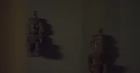 Mayan or Inca statue moving alone on a wall in a creepy haunted house on a 動画素材 110700477