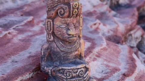 Mayan Statue on Sandstone Ledge Pan to Reveal Stock Footage 35118318