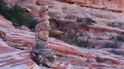 Mayan Statue on Sandstone Ledge Panning Shot Stock Footage 35117570