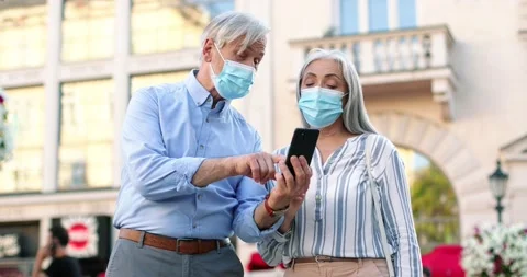 Maybe there. Waist up portrait view of the senior man wearing protective mask Stock Footage 159864207