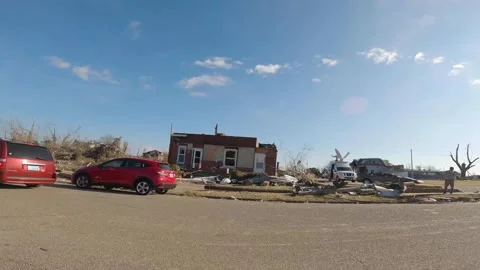 Mayfield Ky Tornado Damage - Damaged Home Cars Drive Past Stock Footage 278122489
