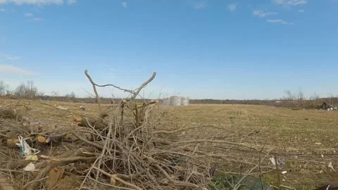 Mayfield Ky Tornado Damage - Slow Motion - Debris Strewn in Field Pt A Stock Footage 278124701