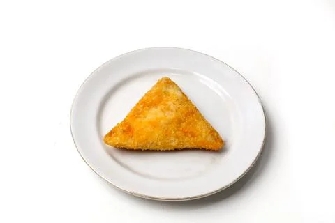 Mayo rissoles are triangular in shape, on a white plate Foto stock
