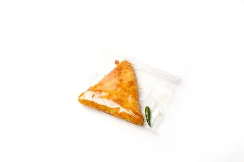 Mayo rissoles are triangular in shape, in plastic packaging Foto stock