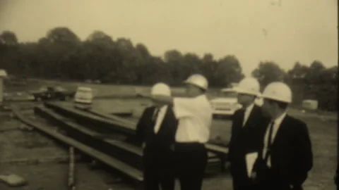 Mayor Beverly Briley observing dam construction site with workers in Nashville,  Stock Footage 248390752