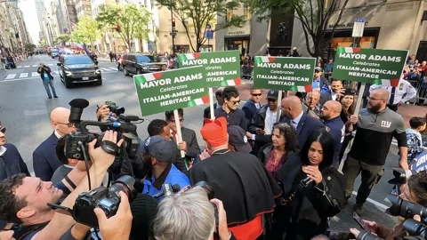 Mayor Eric Adams meets Cardinal Timothy Dolan at the Columbus Day Parade in NYC Stock Footage 218555027
