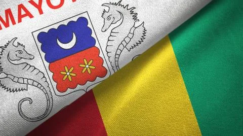 Mayotte and Guinea two flags textile cloth, fabric texture Stock Illustration