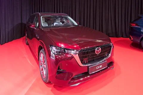 Mazda CX-80 e Skyactive-G Takumi Plus PHEV hybrid car. Stock Photos