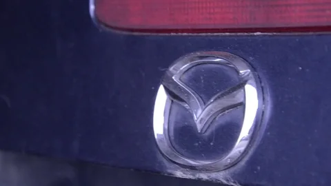 Mazda mx5 miata blu logo Stock Footage 84297758