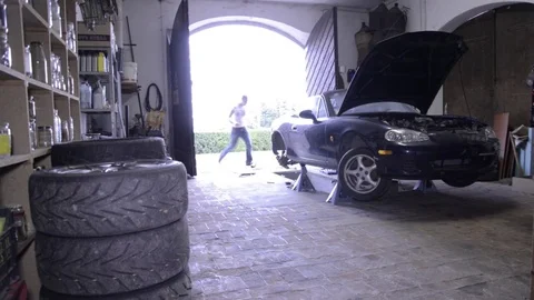 Mazda mx5 miata front angle view with tires Stock Footage 84296778