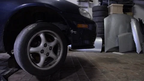 Mazda mx5 miata front lateral angle with moving lights Stock Footage 84296964