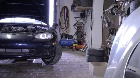 Mazda mx5 miata front view open hood Stock Footage 84296787