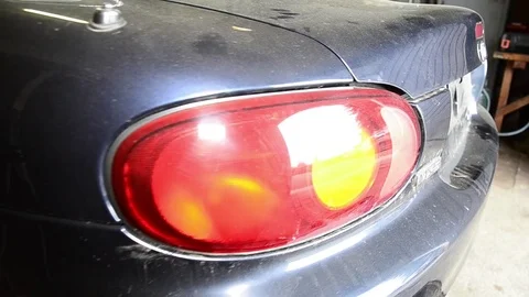 Mazda mx5 miata from rear light to engine bay Stock Footage 84297588