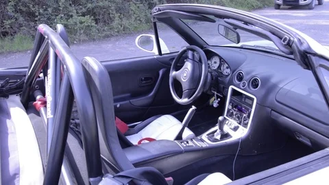 Mazda mx5 miata white interior lateral view Stock Footage 84091625