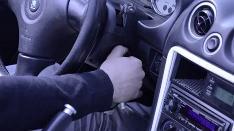 Mazda mx5 miata white switching on internal view Stock Footage 84091747