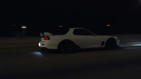 Mazda RX7 making a highway pull Stock Footage 237126617