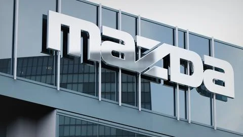 Mazda Stock data presented on the logo of the office facade editorial Stock Photos