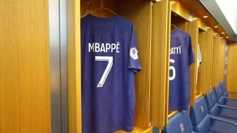 Mbappe player jersey in changing room of PSG football club in Paris France.  Stock Footage 253347648