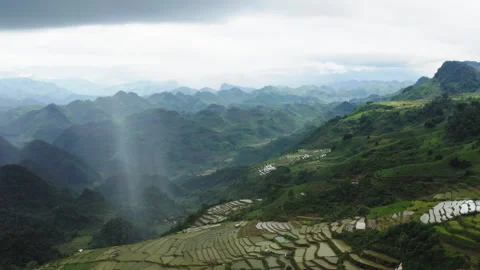 Mộc Châu storm cell through a static drone shot featuring a slow camera Stock Footage 324945590